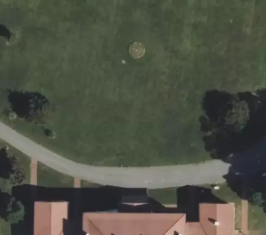 A satellite view of a yard imported into Plantyd, with the property boundary traced as a dashed outline and a measuring line reading 42 feet 8 inches across the lawn